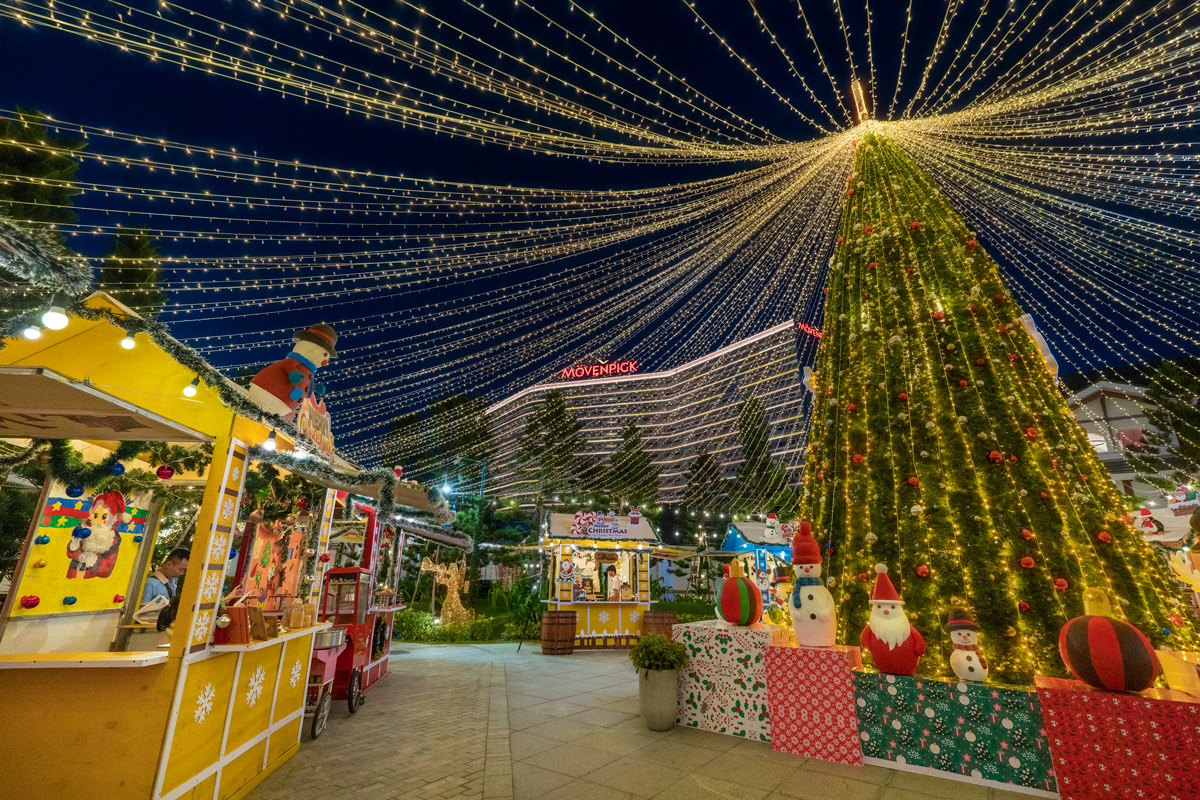 Christmas Village at Mövenpick Resort Cam Ranh with wooden chalets and crafts, baked goods
